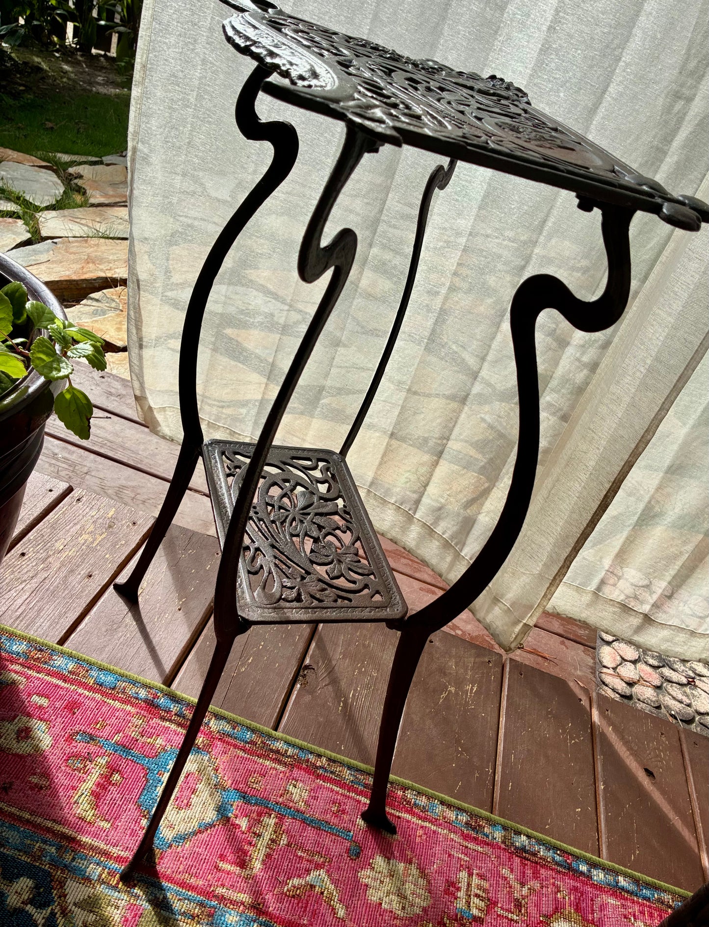 Art deco cast iron plant stand