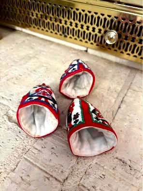 Embroidered egg cozies