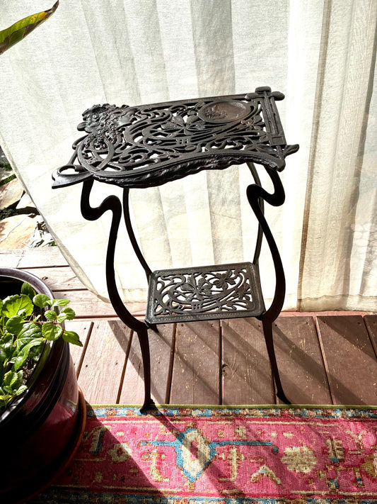 Art deco cast iron plant stand
