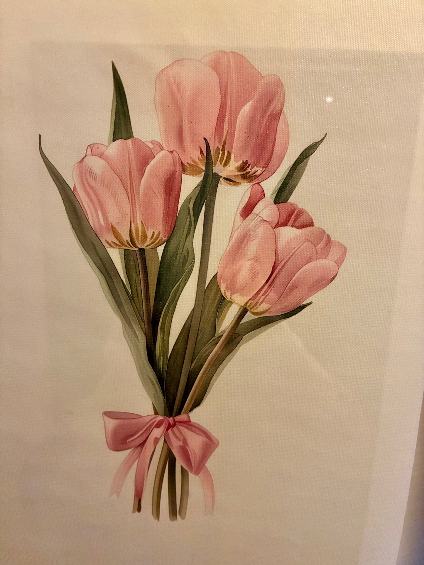Pink tulips and ribbon canvas print in floating gold frame