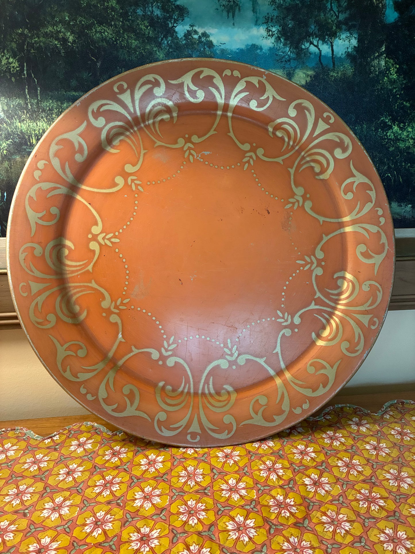Vintage round metal tray with gold highlights