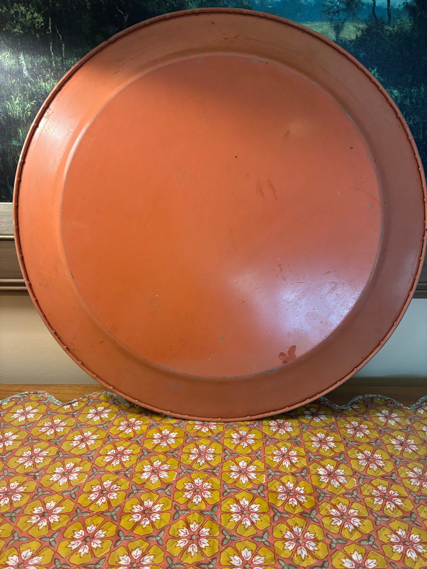 Vintage round metal tray with gold highlights