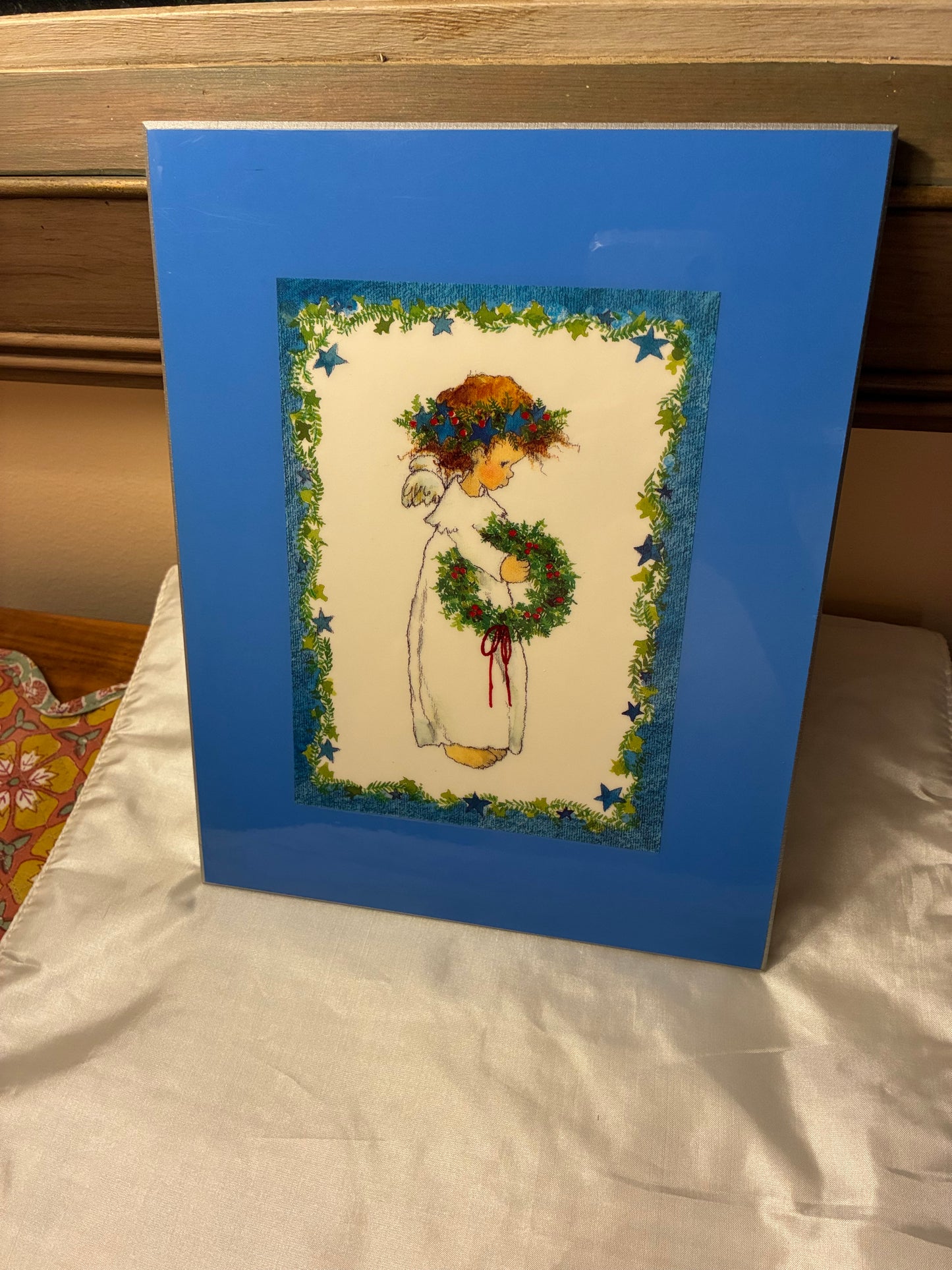 Adorable handpainted lacquered plaque featuring little girl with wreath