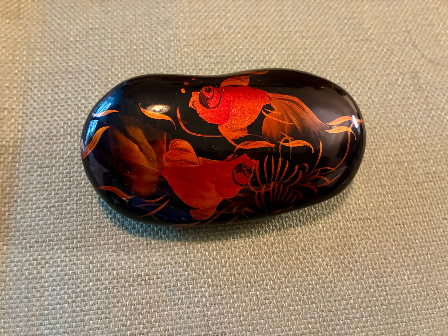 Laquered river rock with koi fish