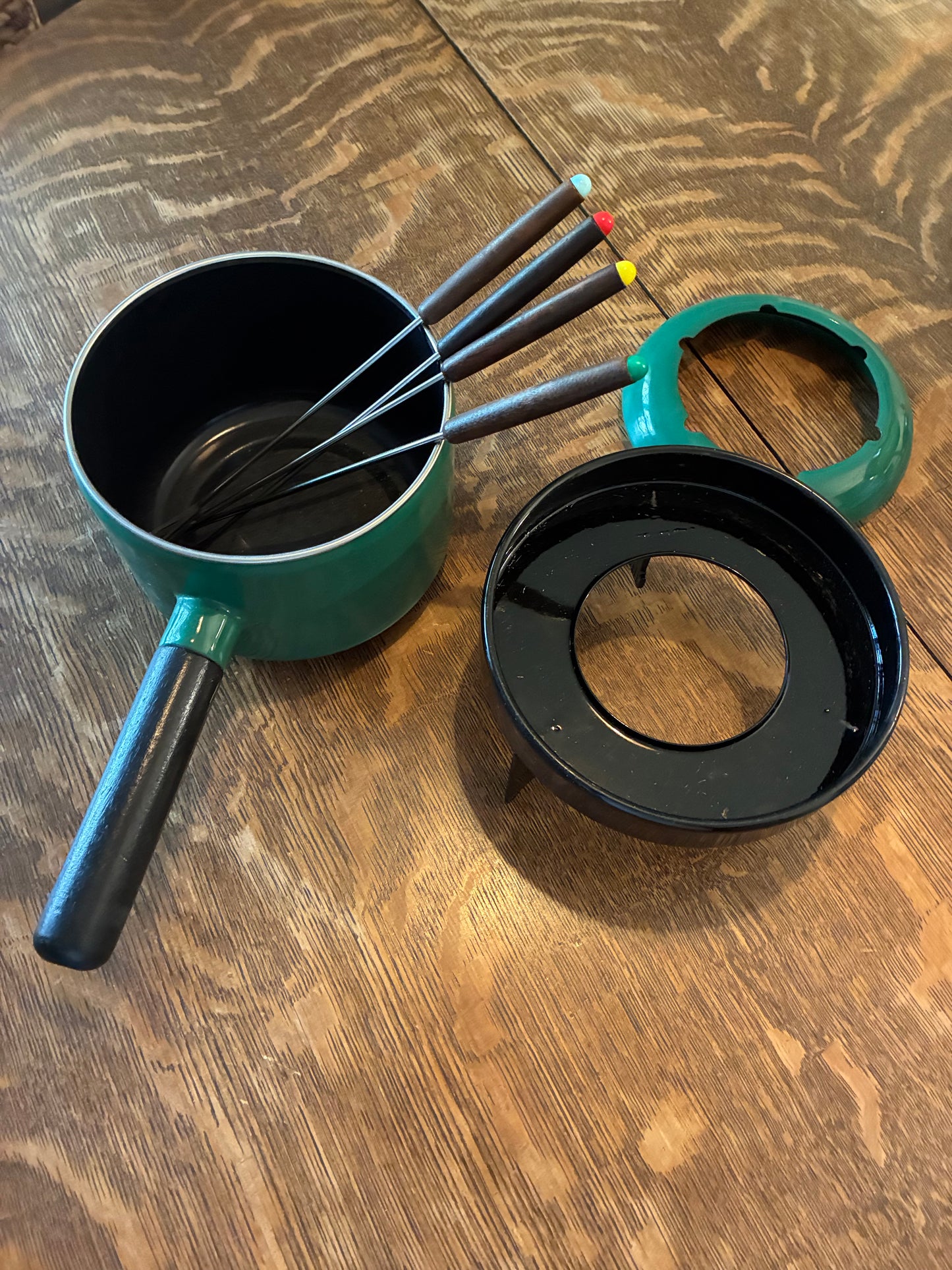 Green enamel fondue pot