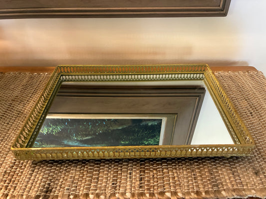 Gold metal filigreed mirror