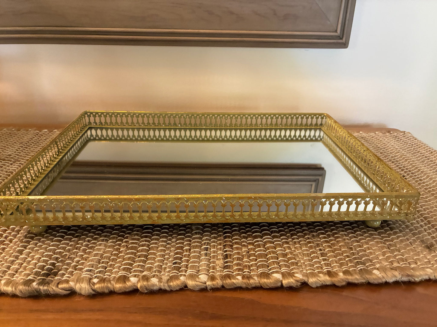 Gold metal filigreed mirror