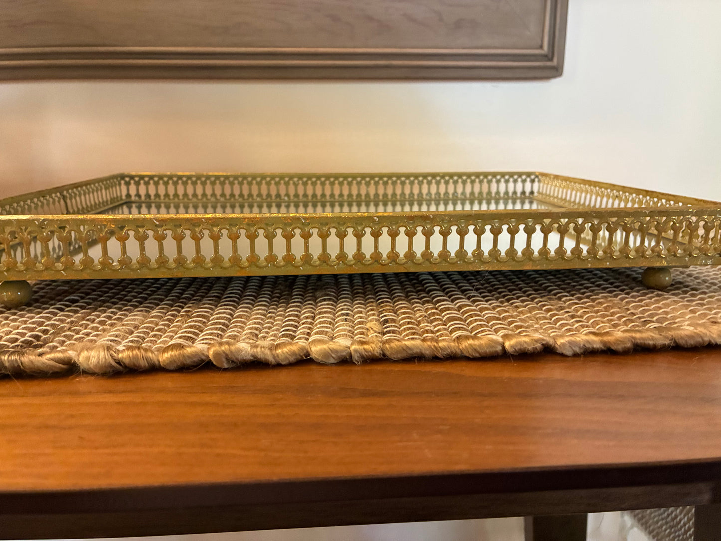 Gold metal filigreed mirror