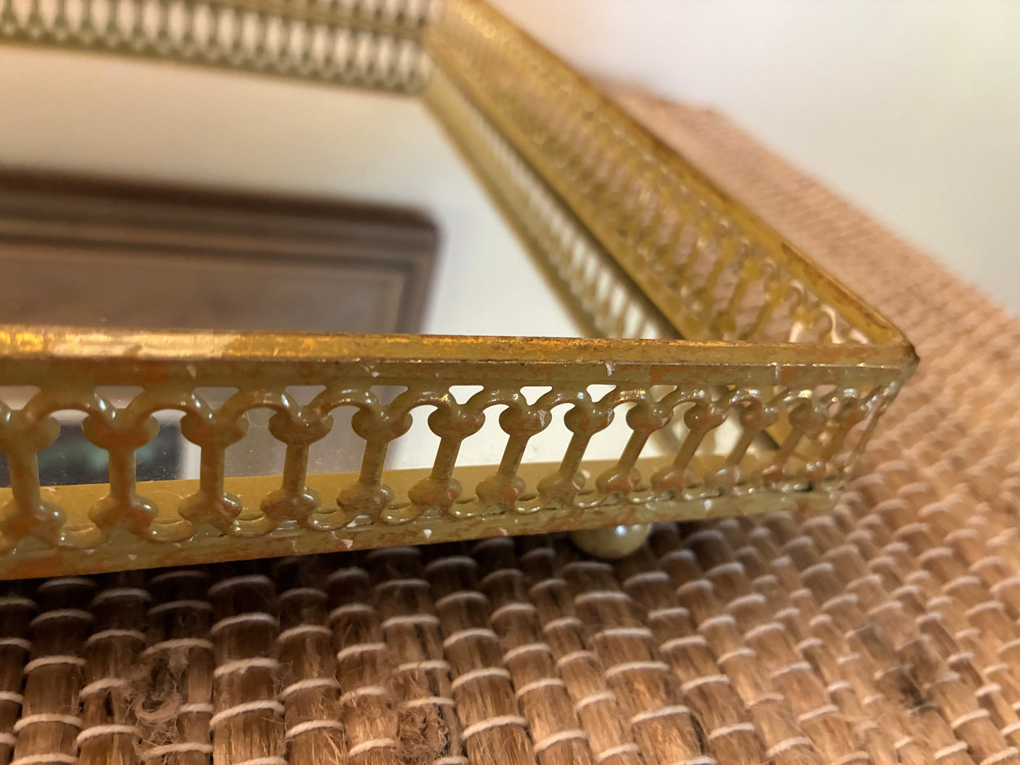 Gold metal filigreed mirror